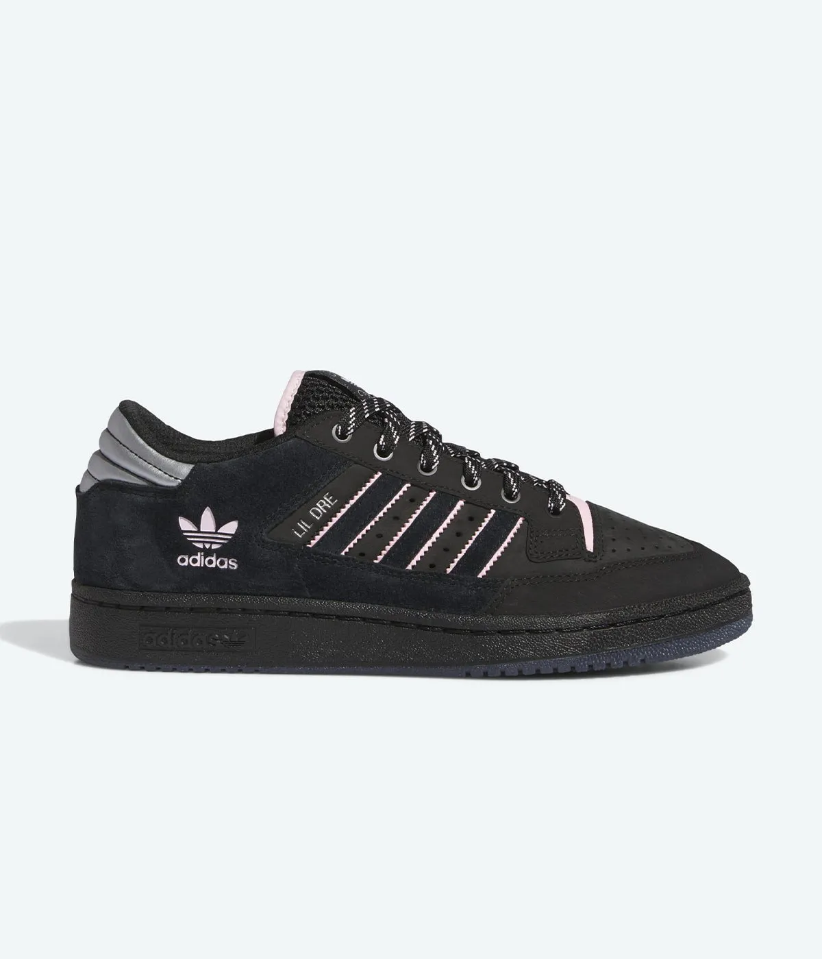 Adidas Centennial 85 Low Adv Lil Dre running in a suspension cable bridge area shoes